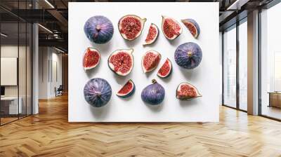 Fresh figs. Food Photo. Creative scheme of the whole and sliced figs on a white background, inscribed in a rectangle. View from above. Copy space Wall mural