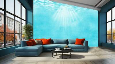 Sunbeams under the rippled ocean water surface Wall mural