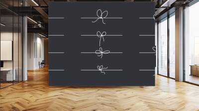 Line bows on ribbon for gift decoration. String with rope knots in doodle style, simple thin line wedding elements isolated on black background Wall mural