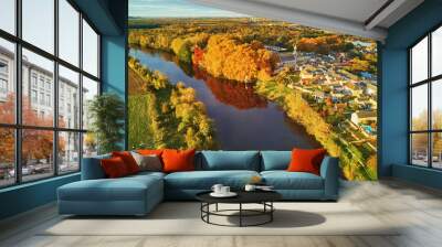 Autumn forest and river Vienne near medieval castle of Les Ormes, France Wall mural