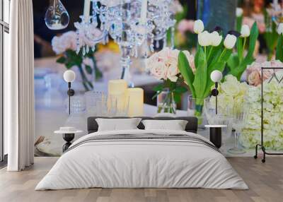 Beautiful table set with candles and flowers Wall mural