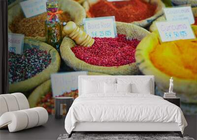 Different kinds of spices and dry herbs on a farmer market in Cucuron, Provence, France Wall mural