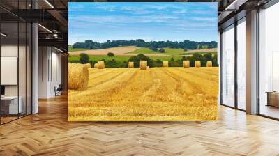 golden hay bales in countryside Wall mural