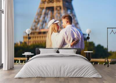 Romantic couple having a date near the Eiffel tower Wall mural