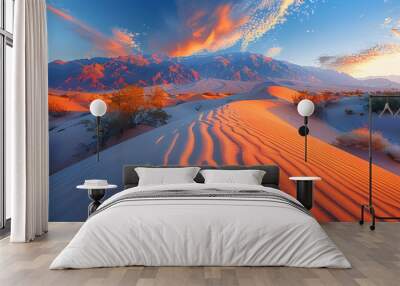 Sunrise over desert dunes. Warm orange hues on sand patterns with distant mountains. Nature's beauty and serenity concept. Design for travel brochure, environmental awareness poster, or wallpaper Wall mural