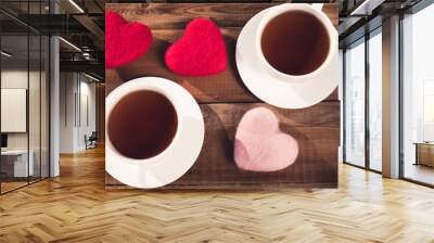 two cups of tea, hearts, top view on a rustic background. Valentine's Day Wall mural