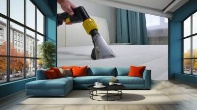 The concept of cleaning and housekeeping. Dry cleaning of the mattress by a professional method. Wall mural