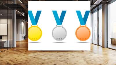 Gold, silver and bronze medals with blue ribbons. Vector medals isolates with shadow on white background Wall mural