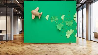 St. Patrick's day, Plane luck Shamrock on a green background Wall mural