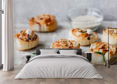 Unsweetened snails and puff pastry with bacon, sesame seeds and rosemary. Wall mural