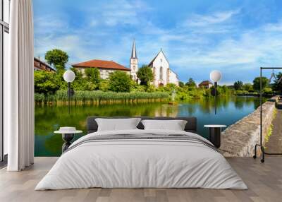 Pond with view of the Catholic Parish Church and castle in Hammelburg- Bavaria Wall mural