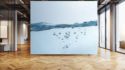 Water splash. Aqua flowing in waves and creating bubbles. Drops on the water surface feel fresh and clean. isolated on white background. Wall mural