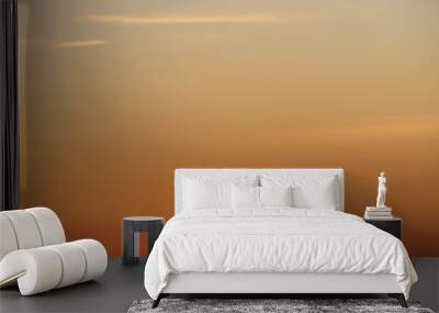 Sky gradient from blue to orange sunset Wall mural