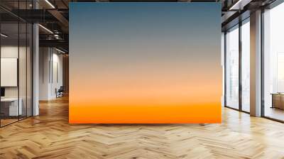 Sky gradient from blue to orange sunset Wall mural