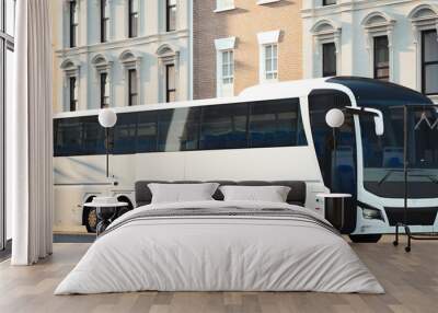 Modern white realistic coach bus at cityscape background. 3d rendering. Front view. Wall mural