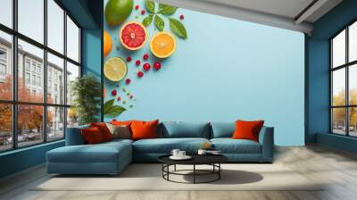 side view of fruits on blue background with copy space, space for text and design  Wall mural