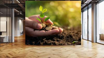 Man Holding Plant with Soil and Gold Coins: Symbolizing the Greater Value of Plant Growth Compared to Gold. Environmental Sustainability, Benefits of Nature, Eco-Friendly and Financial Growth. Wall mural