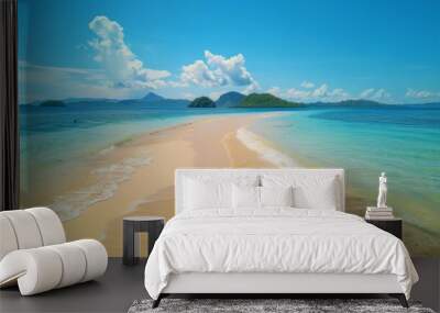 A mesmerizing white sandy path stretches into the horizon, leading towards distant lush green islands, surrounded by vibrant blue waters under a pristine sky. Wall mural