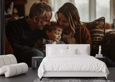 A loving family moment at home, with parents embracing their young child, creating a warm and intimate scene of togetherness and affection in a cozy living room. Wall mural