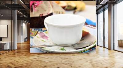 porcelain white cup of coffee with jam on the table Wall mural