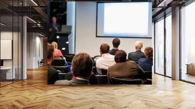 people sitting rear at the business conference Wall mural