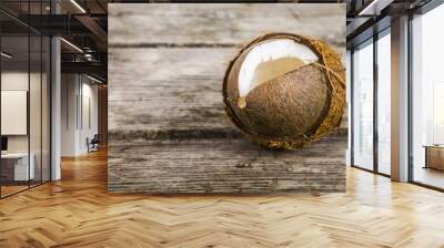 Coconut on a wooden table Wall mural