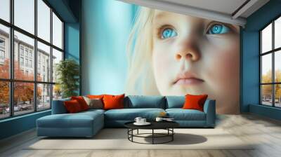 Close up of a face of little girl with blue eyes Wall mural