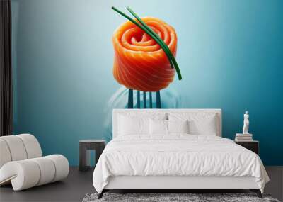 close-up of smoked salmon on a fork over water, adorned with fresh chives. The orange hue of the salmon pops against the calming blue backdrop, offering a visually striking and appetizing composition. Wall mural