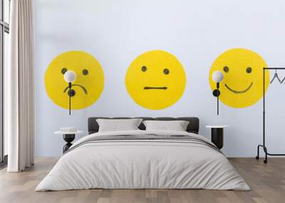 Cut out of paper smiles mood on a white background Wall mural