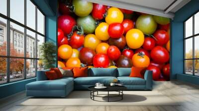 different colorful cherry tomatoes at organic farmers market in provence, france. vignette. Wall mural