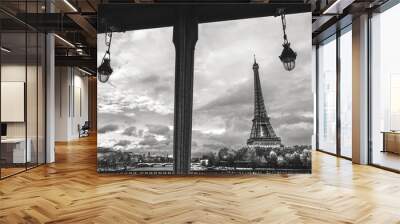 Eiffel tower seen through frame of  Bir-Hakeim bridge. Paris, France. Black and white photo. Wall mural