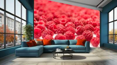 Dripping raspberry on white background. Wall mural