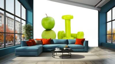 two green apples and dumbbells on white background Wall mural