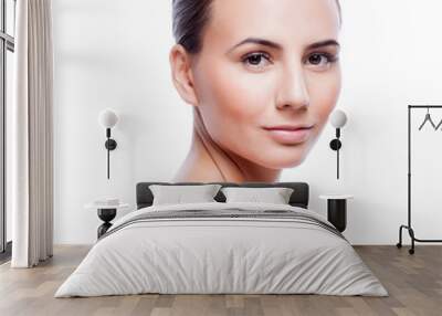 Beautiful face of young adult woman with clean fresh skin - isol Wall mural