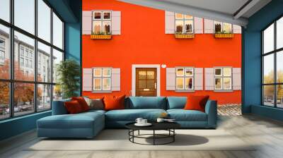 Colorful orange facade of a house in Germany Wall mural