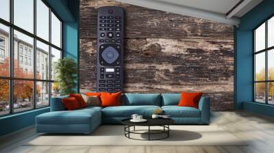 Remote control TV on Wooden Background Wall mural