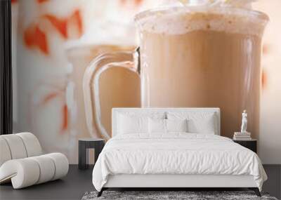 coffee latte macchiato with cream in glasses on leaves backgroun Wall mural