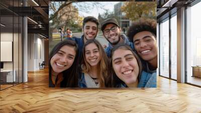 Multicultural friends taking selfie picture with smart mobile phone device outdoors - Group of young people smiling at camera - University students having fun in college campus - Youth culture Wall mural