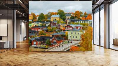 View of old Porvoo, Finland. Beautiful city autumn landscape with colorful wooden buildings. Wall mural