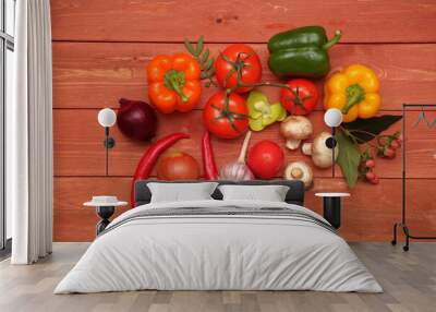 Red pepper. vegetable concept on wooden background. Two red hot peppers. Bulgarian green pepper. branch with tomatoes. garlic, champignons, mushrooms, onions. Wall mural