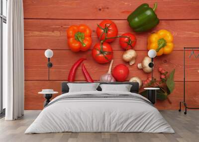 Red pepper. vegetable concept on wooden background. Two red hot peppers. Bulgarian green pepper. branch with tomatoes. garlic, champignons, mushrooms, onions. Wall mural