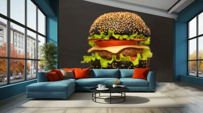 Black Burger on a black background with sesame seeds Wall mural