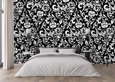 Wallpaper in the style of Baroque. Seamless vector background. White and black floral ornament. Graphic pattern for fabric, wallpaper, packaging. Ornate Damask flower ornament. Wall mural