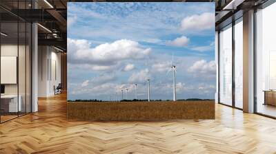 Windmills that produce electricity. Wheat field. Wall mural