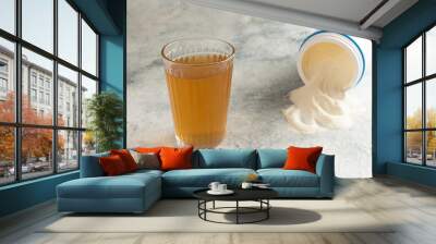 collagen and bone broth on a gray background Wall mural