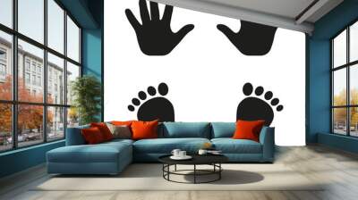 Prints of hands and feet of a child on a white background Wall mural