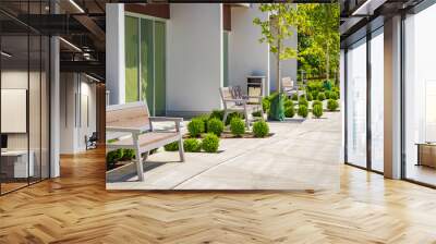 Green city street with walkway in residential area in sunny summer day Wall mural