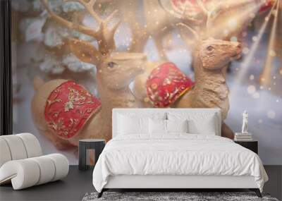 Two Christmas golden reindeer toy. Winter holiday decoration close up. Copy space Wall mural