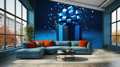 Blue gift box with bow isolated on blue background Wall mural