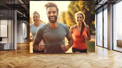 Running people. Happy Healthy group middle aged. Friends running together. Early morning workout. Wall mural